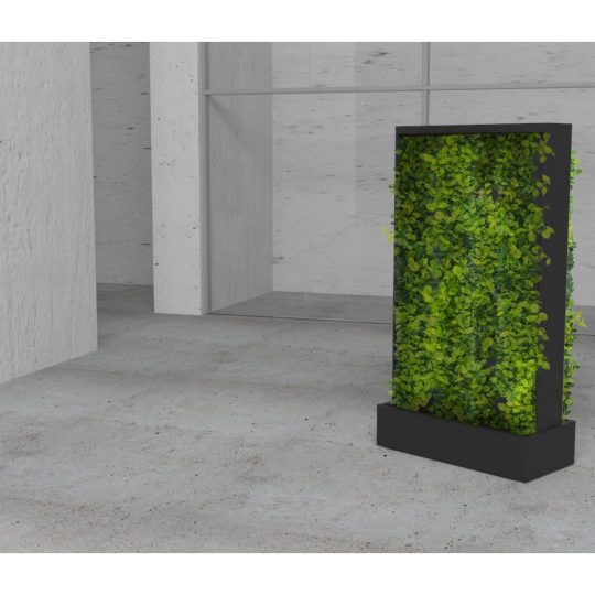 Mobilna ściana z mchu zapewnia dźwiękochłonność.